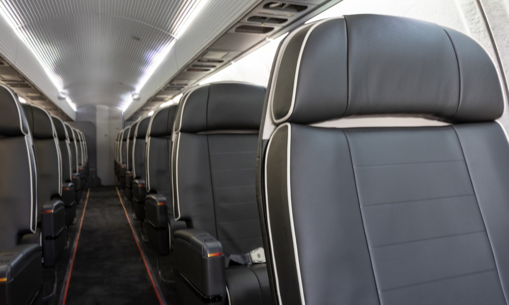Interior regional aircraft conversion on Embraer aircraft - photo of a single row of aircraft seats
