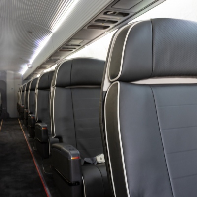 Interior regional aircraft conversion on Embraer aircraft - photo of a single row of aircraft seats